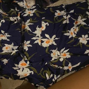 of navy loose shorts with matching tie belt